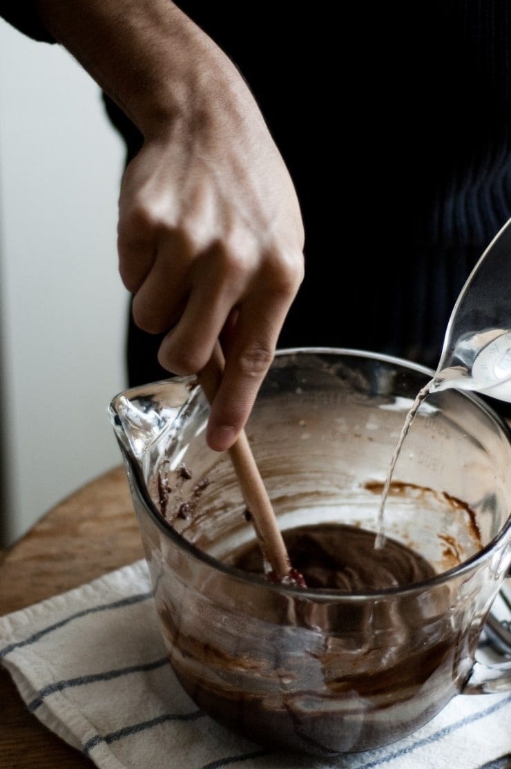 Mixing boiling hot water into cake batter