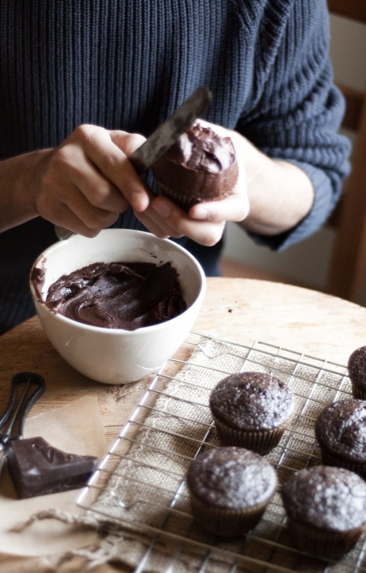 Frosting a cupcake